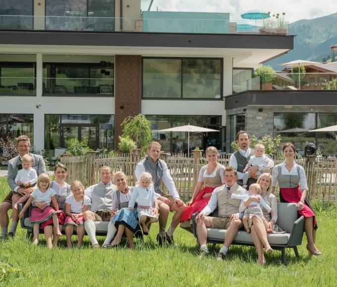 Family group picture in front of the hotel in summer
